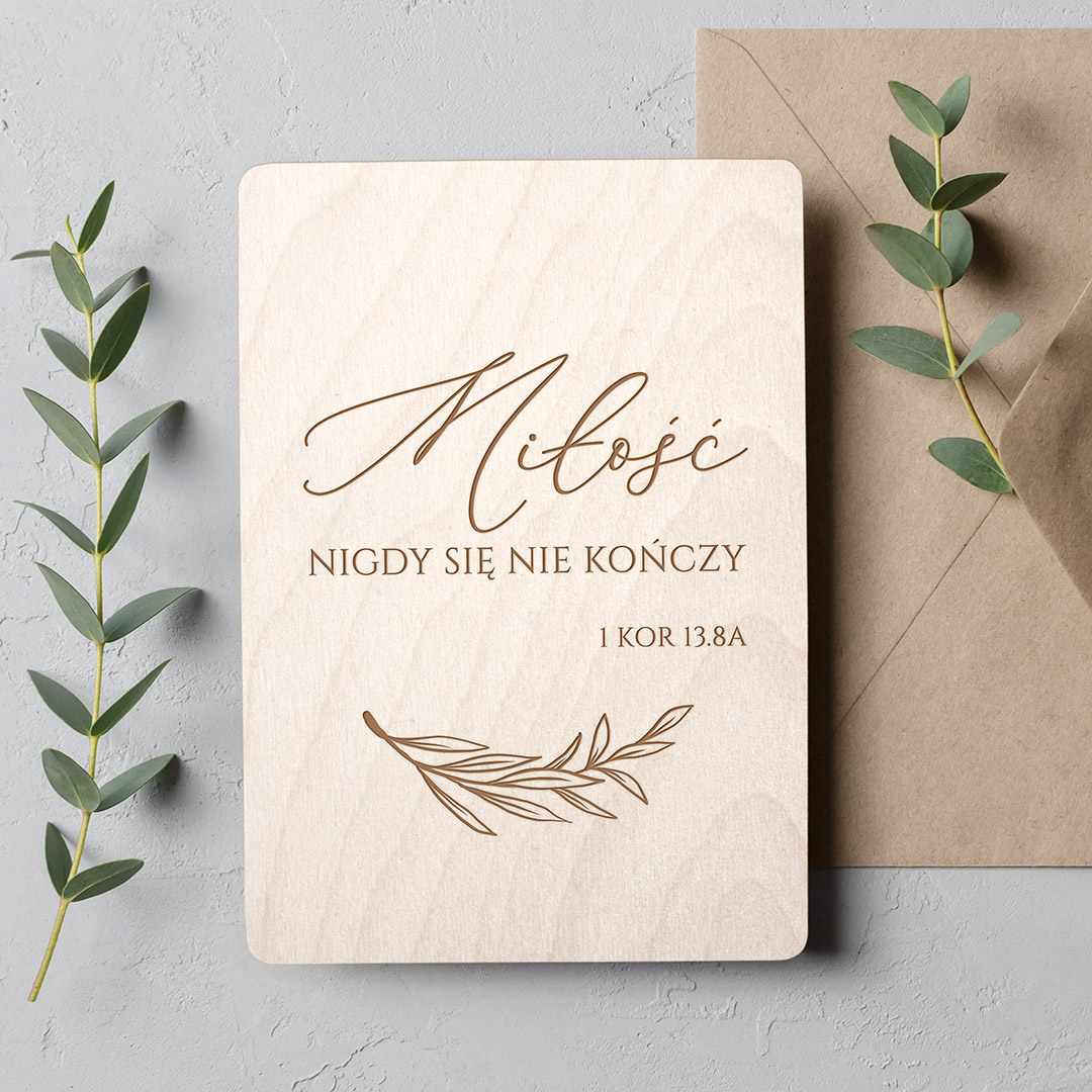 Wedding invitation or blank greeting card mockup with eucalyptus twigs and envelope